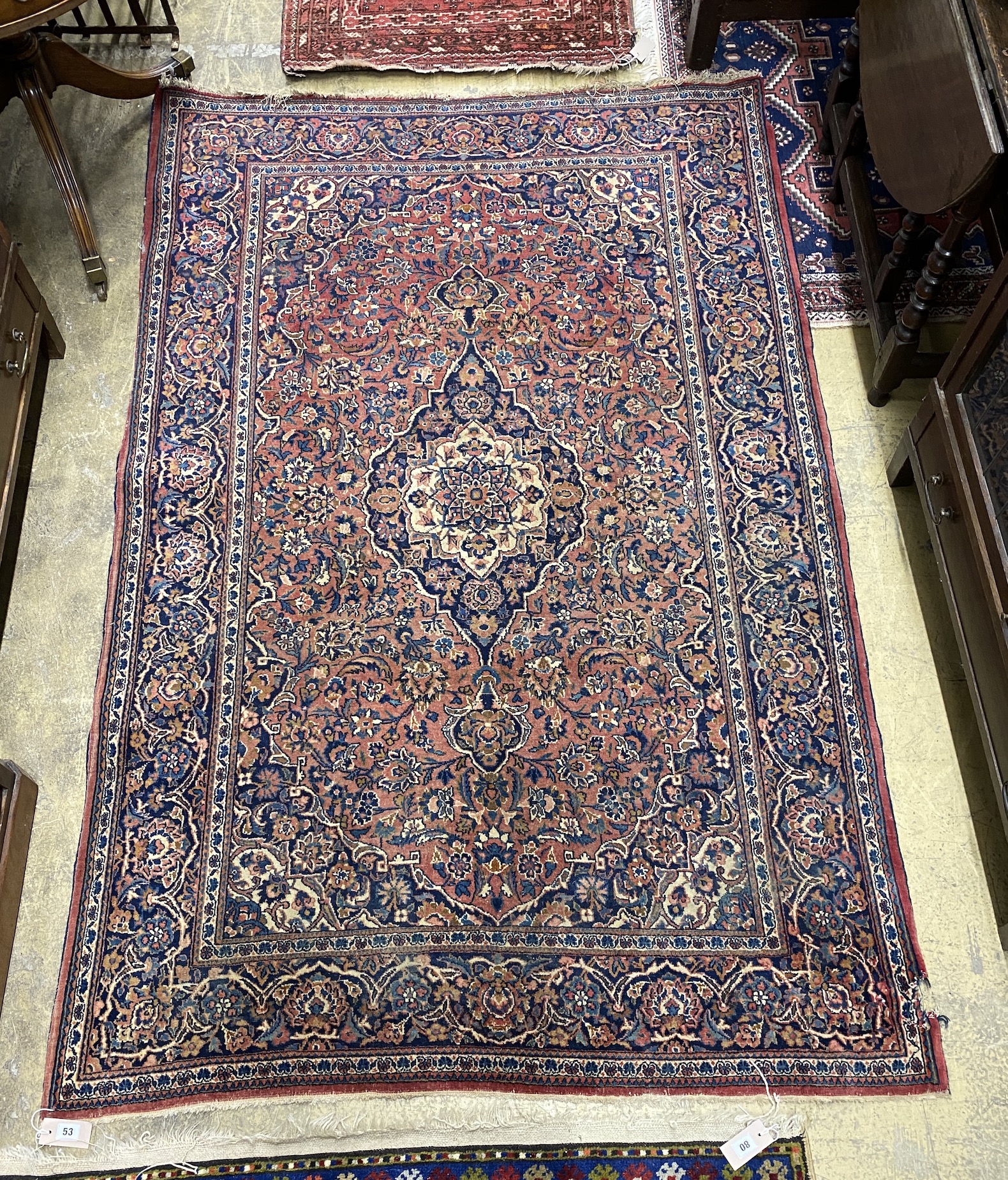 An Isphahan red ground rug, 206 x 133cm together with a Bokhara red ground runner